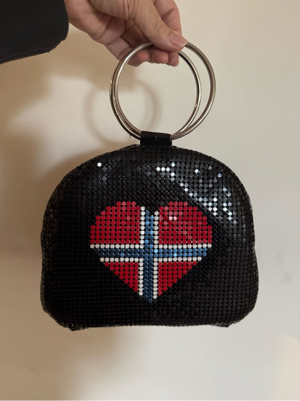Vintage “Laila" mesh handbag featuring a heart-shaped Norwegian flag design.
